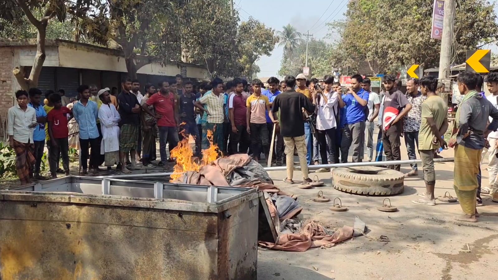 নওগাঁয় সড়ক দুর্ঘটনায় শিক্ষক নিহত: বিক্ষোভ ও অগ্নিসংযোগ